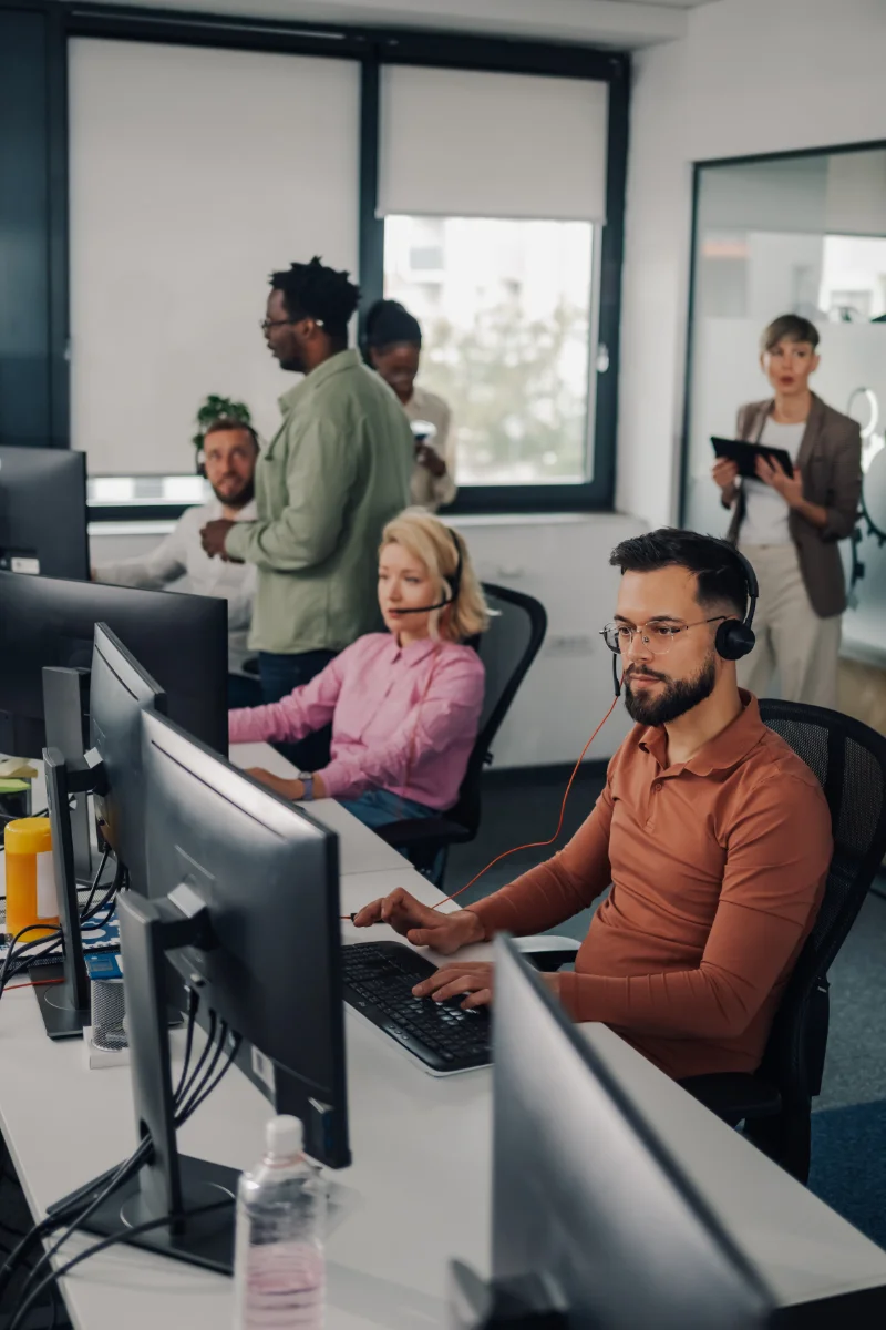 team working in busy customer support center