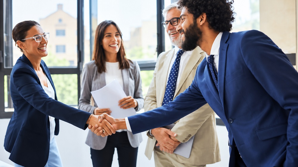 Successful Business Handshake in Modern Office